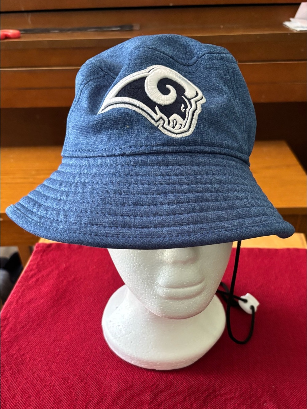 New Era Navy Bucket Hat with White Ram Logo